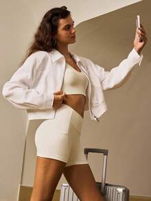 Menodora SHEIN Sport Áo thun tay dài màu trơn khóa kéo ngắn thường ngày dành cho nữ - trắng - Xem 1