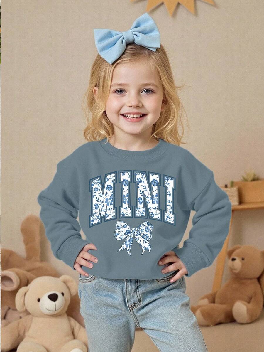 SHEIN Playful Pals Sweatshirt für Kleinkind Mädchen, lässige Mode mit kreativer Schleife, Blumen-Grafik, Slogan-Aufdruck, Rundhalsausschnitt, Herbstoutfit