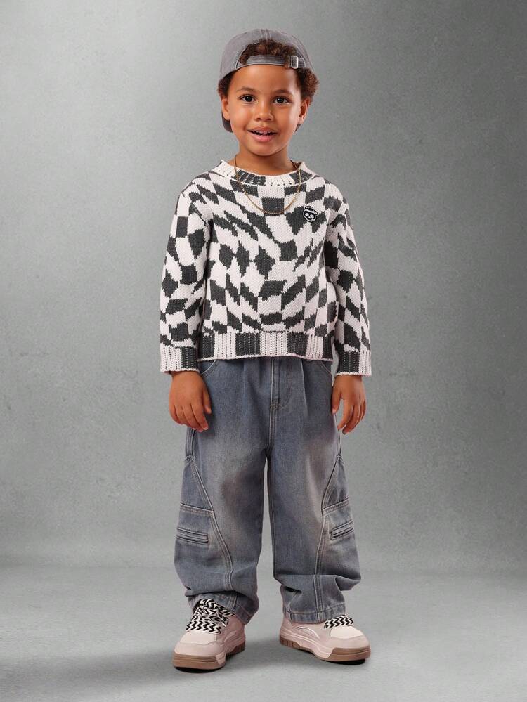 Sweter z dzianiny w geometryczną kratkę z naszywką z czaszką