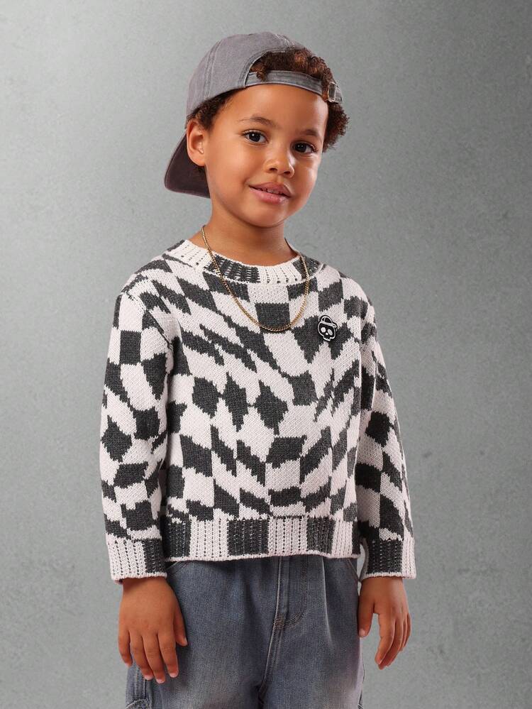 Sweter z dzianiny w geometryczną kratkę z naszywką z czaszką