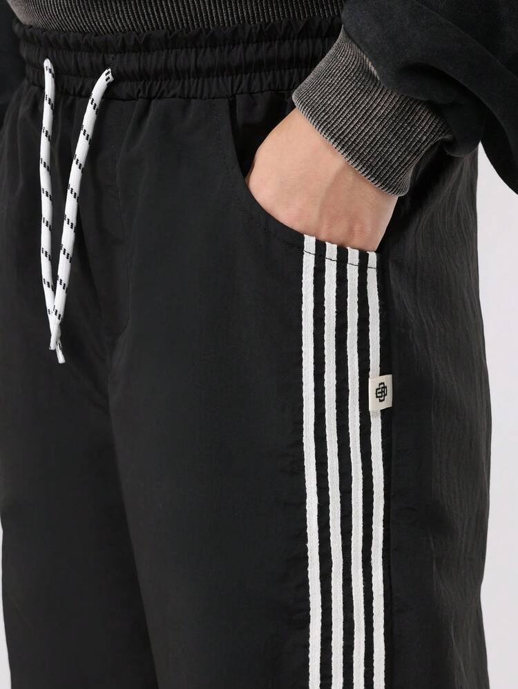 Track Pants With Side Stripe Panels And Elastic Cuffs