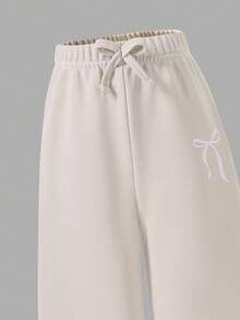 SHEIN Explorewe 女童阔腿裤，腰间系带，印花图案，休闲运动风，适合返校季和秋冬季穿着。