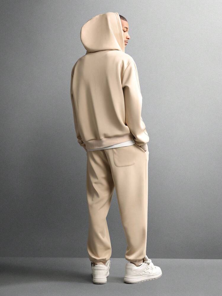 Sweat à capuche zippé et jogging avec détails à nervures