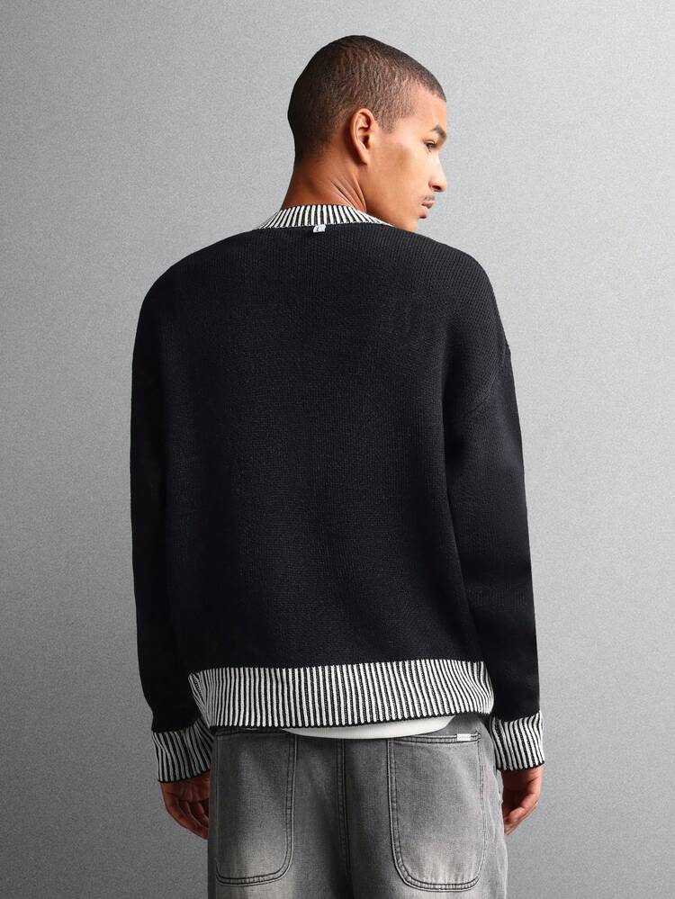 Suéter de punto con ribete de canalé a rayas