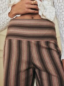 Nöista Muted Tones And Soft Vertical Lines Offer A Refined Silhouette With A Flared Leg. Styled With A Brown Sweater Or Going Out Tops For Women, It Pairs Well With Elegant Blouses For Women During Fall And Autumn.