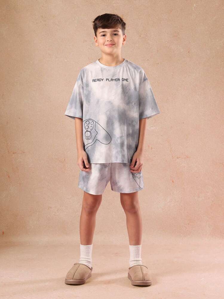 Pigiama tie-dye con controller da gioco