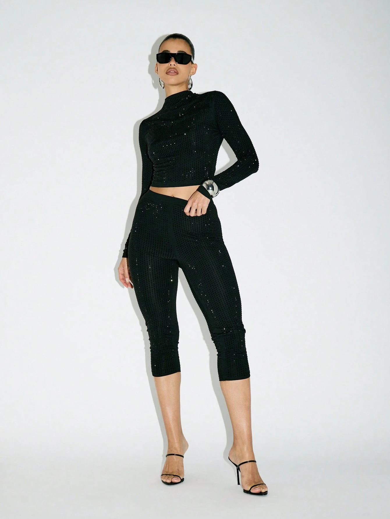 KIZN Leggings capri con lentejuelas y tiro alto