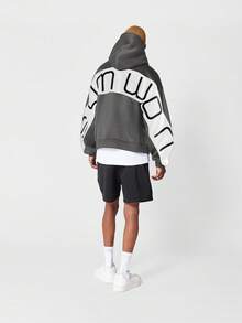 SUMWON Oversized Drawstring Hoodie With Curved Back Lettering Urban Streetwear Contemporary Cut And Sew Block Panel Centre Pocket Layering Pullover - Dark Grey - View 3