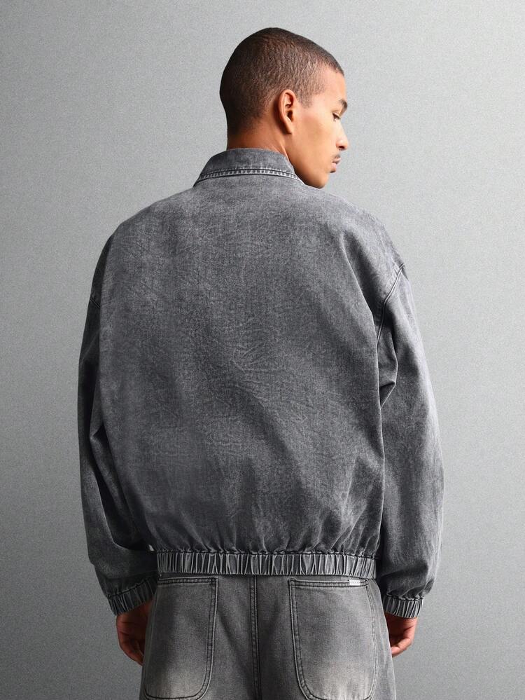 Veste camionneur en jean délavé vintage avec fermeture éclair sur le devant