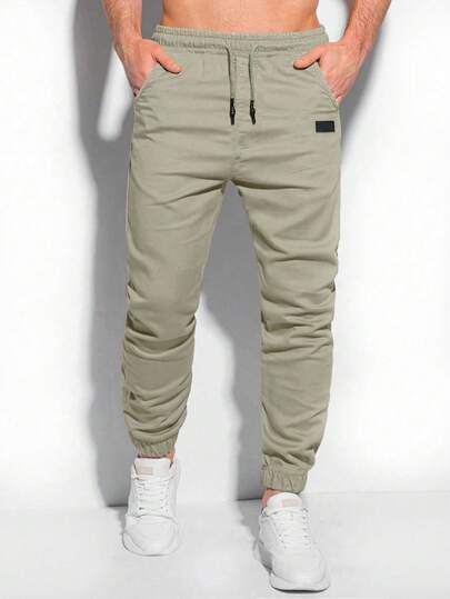 Manfinity Homme Pantalones jogger para hombre con bolsillos parche y puños elásticos, otoño