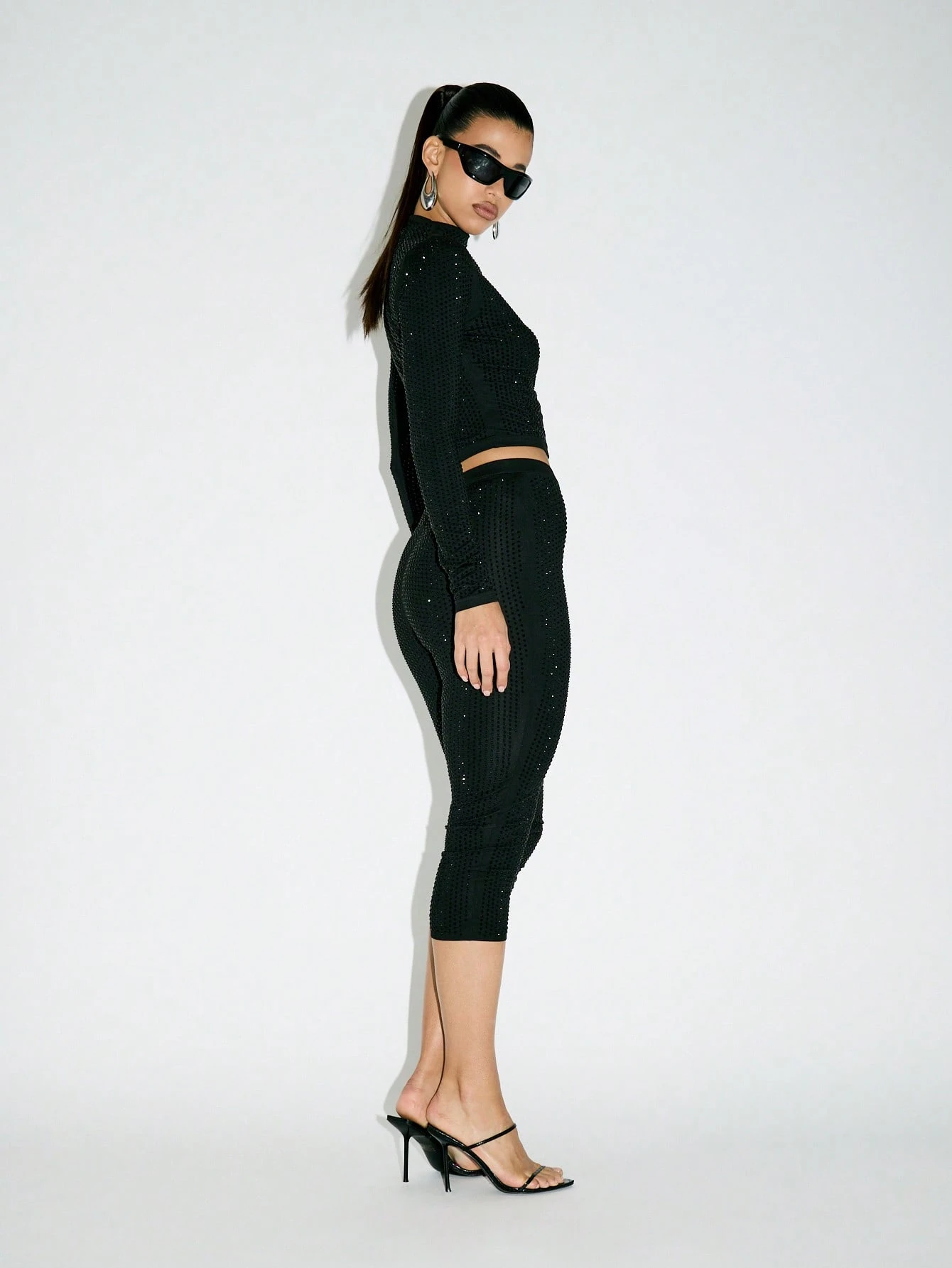 KIZN Leggings capri con lentejuelas y tiro alto