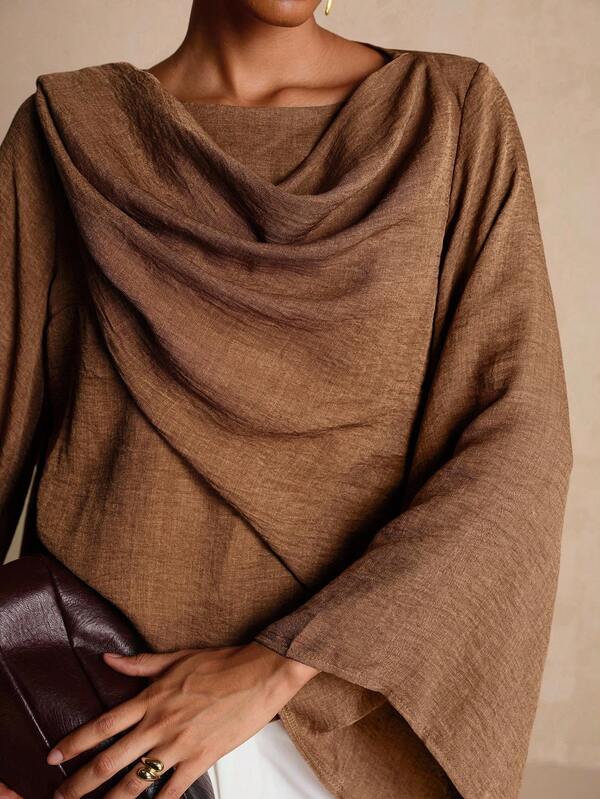 Vesra Top elegante assimétrico