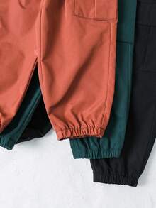 SHEIN 3pcs Young Boys Casual Sports Streetwear Cute Vacation Black Decorative Stripe Loose Fit Green/Black/Khaki Jogger Pants, Suitable For Daily Wear, School, Travel, Sports, Spring/Summer/Autumn/Winter Parachute Pants Windbreaker Pants Pants Pack Cargos Baggy Cargo Pants