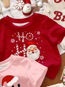 SHEIN 3 pièces T-shirts à col ras du cou manches courtes décontractés pour bébés filles avec des motifs de Noël mignons comme amande crème, rose crème, rouge de Noël, célébration de dessin animé, bonhomme de neige amusant, flocon de neige, Père Noël, convenant pour toutes les saisons - Multicolore - Voir 5