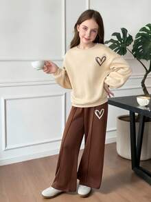 SHEIN Girlism Tween Girls Casual Heart Print Knit Solid Khaki Color Loose Drop Shoulder Long Sleeve Hoodie And Solid Brown Color Wide Leg Sweatpants Set, Suitable For Autumn Winter Daily Wear Teen Girl Brown Set Kids Wide Leg Pants Girl Wide Leg Pants Tween Girl Sweatshirt Pants Set Girls Heart Sweatshirt Set, Khaki And Brown Sweatshirts Outfits Fall, Girl Clothes Autumn And Winter Clothes Girl Brown Outfit Full Outfit Set Girls Brown Outfit Brown Outfit Set