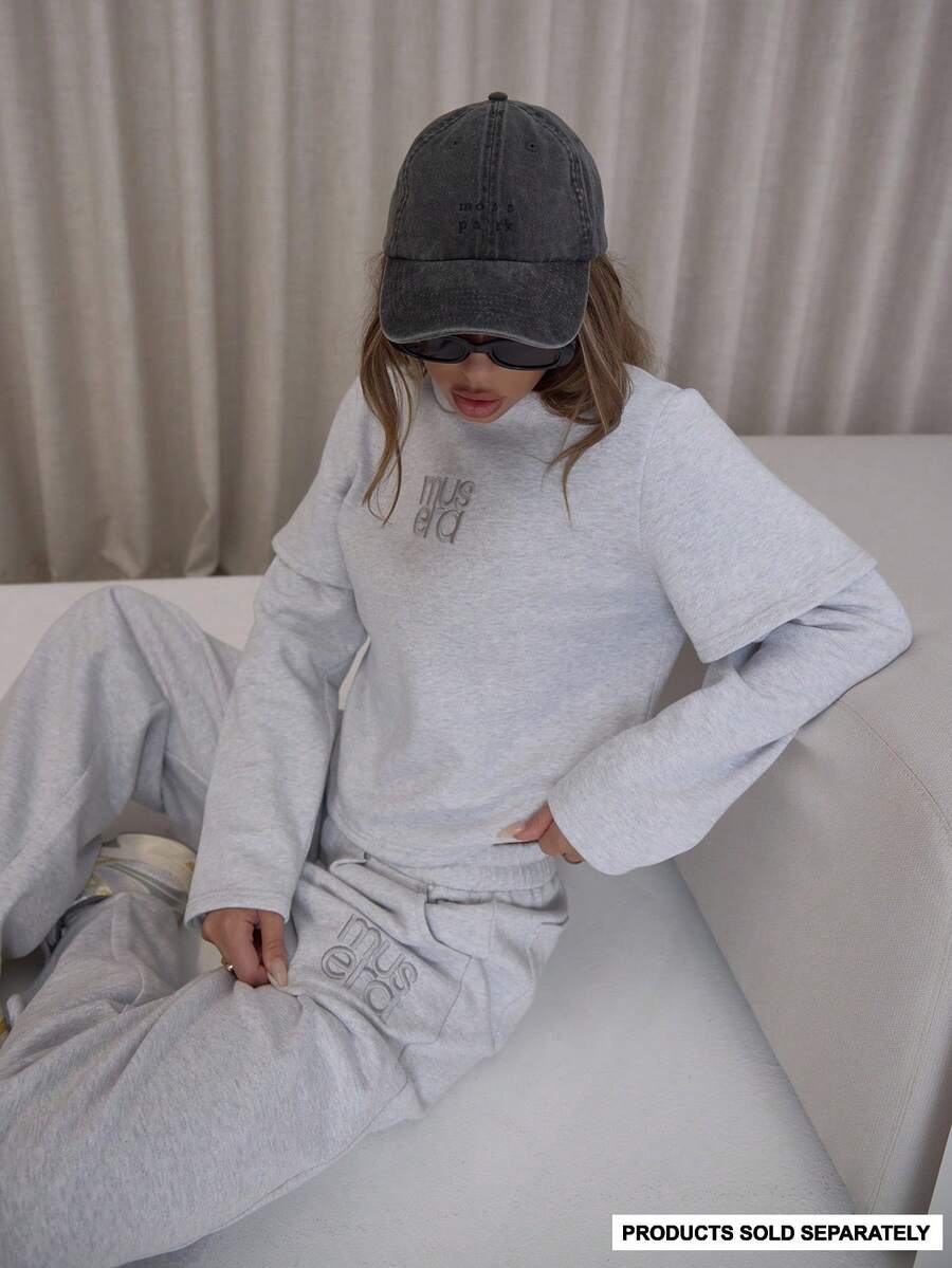 MUSERA Sweat-shirt-shirt col rond à double couche avec logo "Musera" brodé. Top , élégant, classe et sexy pour les sorties d'automne, les soirées de Noël, etc.