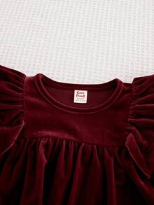 Cozy Pixies Vestito a maniche lunghe per bambina, in maglia tinta unita, con collo rotondo, volant all'orlo e vita stretta