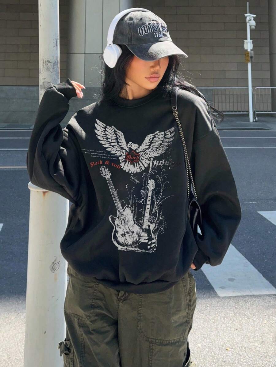 SHEIN EZwear Áo nỉ nỉ dày cổ tròn tay dài in hình đàn guitar và đại bàng phong cách Grunge thường ngày dành cho nữ, phù hợp cho mùa thu/đông - màu đen - Xem 1
