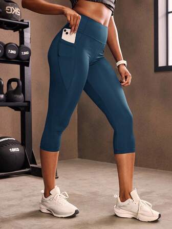 Capris Collants de sport Respirants Douceur Haute élasticité Taille large Leggings de sport avec poche pour téléphone Pantalons de yoga pour femmes