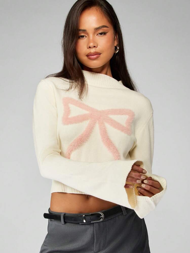 MISSGUIDED Pull court élégant à manches cloche avec motif nœud rose moelleux. Pull tricoté col montant pour l'hiver et les fêtes
