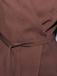 Nöista Elegant And Versatile, This Brown Jacket Features A Wrap Design With A Self-Tie Belt That Flatters The Waist. The Tailored Fit And Lapel Collar Give It A Polished Look, Perfect For Work Or Evening Wear. A Chic Brown Blazer For Women That Adds Sophistication To Any Outfit.