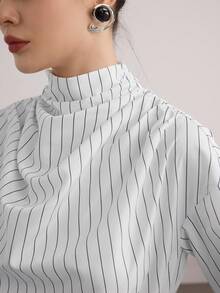 Heiryn قميص نسائي فضفاض بأكمام طويلة منسدلة مع ياقة، مخطط، عصري وشامل الاستخدامات