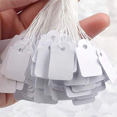 200 szt. 35x22mm puste etykiety cenowe ze sznurkiem bawełnianym, karton Kraft, biały, wodoodporny, odporny na rozdarcie, do cen detalicznych, biżuteria, opakowania na prezenty, przyjęcia weselne, artykuły sklepowe