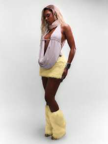 SUMWON WOMEN Fluffy Faux Fur Mini Skirt Winter Party Club Festival Clubwear Costume Y2K Fashion Rave Wear Holiday NYE Skirt - Light Yellow - View 4