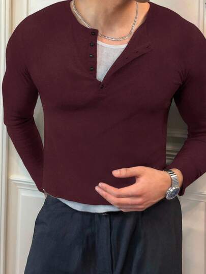 Manfinity Dauomo Camiseta de manga larga casual de ajuste delgado con botones frontales de unicolor para hombres, para el otoño