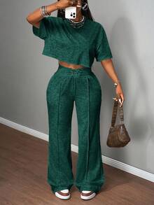 Slaydiva 2025 Spring And Summer New All-Match Casual Street Style Black And Gray Snowflake Fabric, Round Neck Loose Short-Sleeved T-Shirt + High Waist Strap Flared Trousers Ladies Two Pieces Suit, Suitable For Music Festivals, Easter, St. Patrick, Daily Outings, Parties, Graduation Season, Sports And Leisure