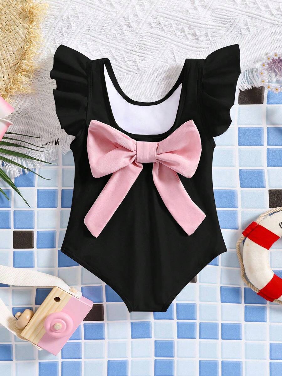SHEIN Bộ áo liền quần tay ngắn hở lưng trang trí nơ cho bé gái, đồ bơi đi biển, áo tắm màu đen cho bé gái, áo tắm liền thân màu đen có nơ cho bé gái, áo tắm xếp bèo cho bé gái, đồ bơi cho bé gái. - màu đen - Xem 1