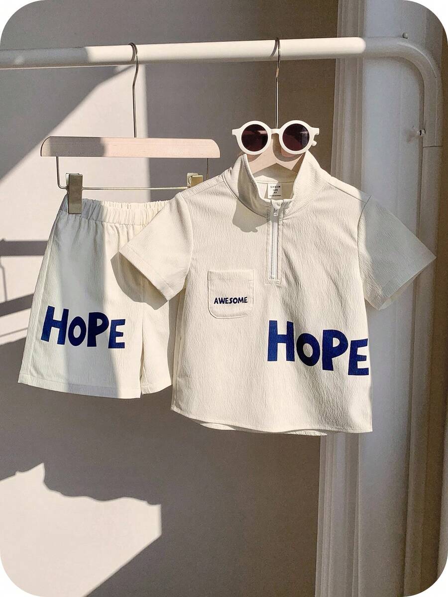 SHEIN 男童休闲字母印花短袖 T 恤和短裤两件套服装，时尚实用风格，适合儿童服装、男童服装、返校、生日派对、日常穿着、上学、旅行、运动、春夏季 - 白色 - 查看 1