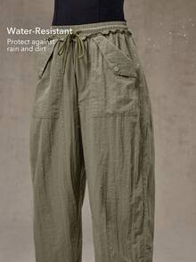 OutZeal Pantalones de mujer resistentes al agua con volantes, cintura con cordón y bolsillos para senderismo y camping en otoño e invierno