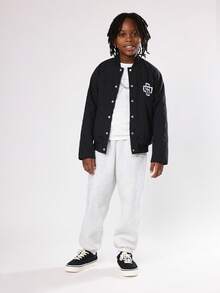 SUMWON Quilted Bomber Jacket Winter Kids Varsity Style Outerwear With Monogram Logo Classic Hip Length Fashion Youth Streetwear Snap Button Closure - Black - View 3