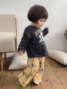 DAZY Conjunto de 2 piezas de pijama para niñas bebé con camiseta de manga corta con estampado de dibujos animados + pantalones holgados casuales a cuadros