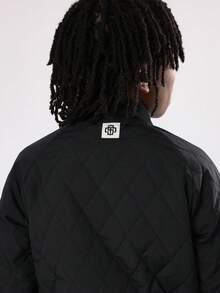 SUMWON Quilted Bomber Jacket Winter Kids Varsity Style Outerwear With Monogram Logo Classic Hip Length Fashion Youth Streetwear Snap Button Closure - Black - View 7