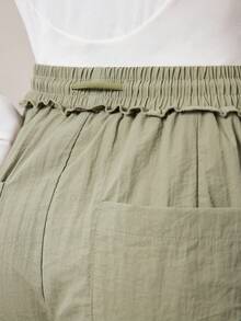 OutZeal Pantalones de mujer resistentes al agua con volantes, cintura con cordón y bolsillos para senderismo y camping en otoño e invierno