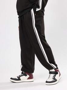 SUMWON Youth Boys Sporty Two Piece Outfit Side Stripe Hoodie Sweatpants Set With Centre Pocket Drawstring For School Daily Casual Wear Fall Winter - Black - View 4