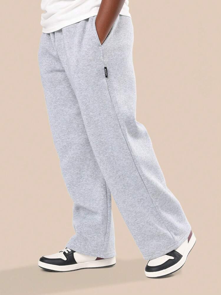 Heathered Loose Fit Pants With Side Pockets And Elastic Ankles