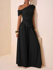 Zivah 2025 春夏新品音乐节、复活节、圣帕特里克节、西部风、游牧风、生日派对、毕业典礼、学院风、学生风、日常休闲、基本百搭、休闲、度假、邮轮旅行、海滩、日光浴、病毒式传播、街头服饰、婚礼宾客波西米亚风、通勤、早午餐、机场服装 - 杏色不对称肩部褶皱弧形下摆短款上衣和阔腿裤纹理面料两件套 - 黑色 - 查看 5