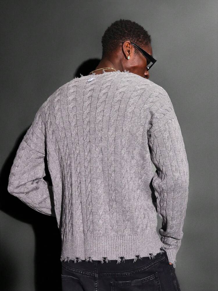 Cable Knit Sweater With Distressed Hem And Ribbed Trim