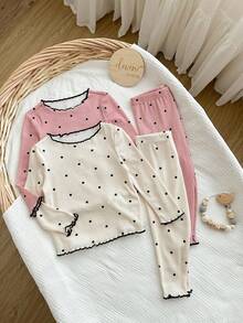 买3送1高性价比波点心形元素图案女宝宝4件套圆领T恤长裤柔软舒适睡衣套装居家适用秋冬适用。
