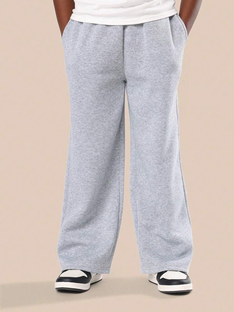 Heathered Loose Fit Pants With Side Pockets And Elastic Ankles