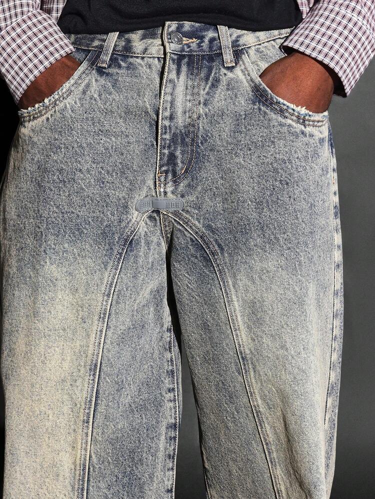 Jeans a gamba larga con pannelli e orlo rovinato