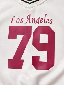 一套女童运动休闲套装，包含一件印有“洛杉矶79”字样的棒球夹克和一条浅蓝色阔腿裤，厚度适中，适合日常穿着，春秋/秋冬季皆宜。 - 杏色 - 查看 5