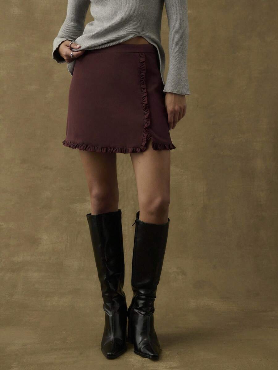 Nöista 棕色裙子带有精致的荷叶边饰边，增添了女性的动感；是秋季出游的温暖选择，也是圣诞节和安静的新年聚会等冬季节日的漂亮选择。 - 酒紅色 - 查看 1