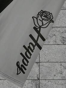 Manfinity LEGND Camiseta casual de cuello redondo de manga corta con estampado de letras y flores para hombres, con contraste de color