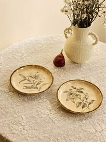 Cirelle 1 Đĩa sứ vẽ tay cổ điển 6 inch – Thiết kế hoa trà và hoa huệ theo phong cách retro tinh tế, đĩa ăn bít tết sang trọng. Khay trưng bày nhẫn và dây chuyền viền nổi thủ công cao cấp. Hoàn hảo để trang trí nhà cửa, làm đồ dùng bàn ăn, hộp đựng trang sức, quà tặng hoặc khay trang trí lối vào. - Nhiều màu - Xem 2