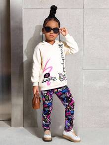 SHEIN 年轻女孩 2 件套：有趣的图案印花连帽运动衫和紧身裤，适合秋冬季、日常、休闲、运动、街头服饰