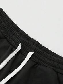ROMWE MEN Street Life Pantalones de chándal rectos con cremallera y estampado de retazos, estilo casual de calle, unisex, para otoño/invierno - Negro - Ver 7